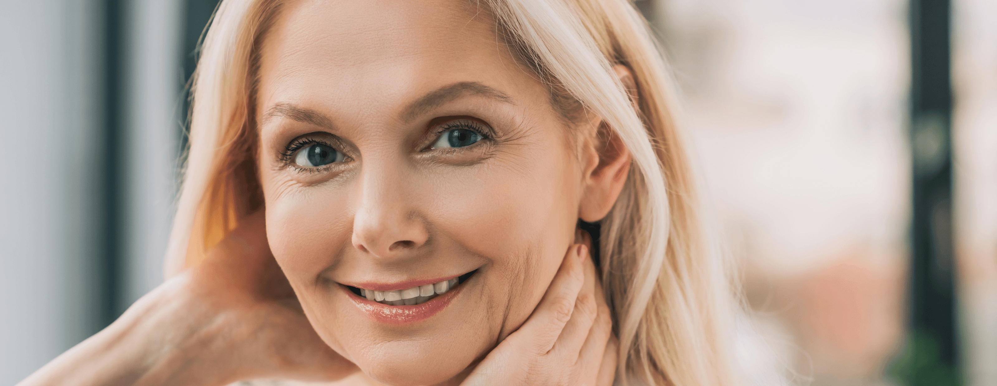 Woman smiling with dental implants